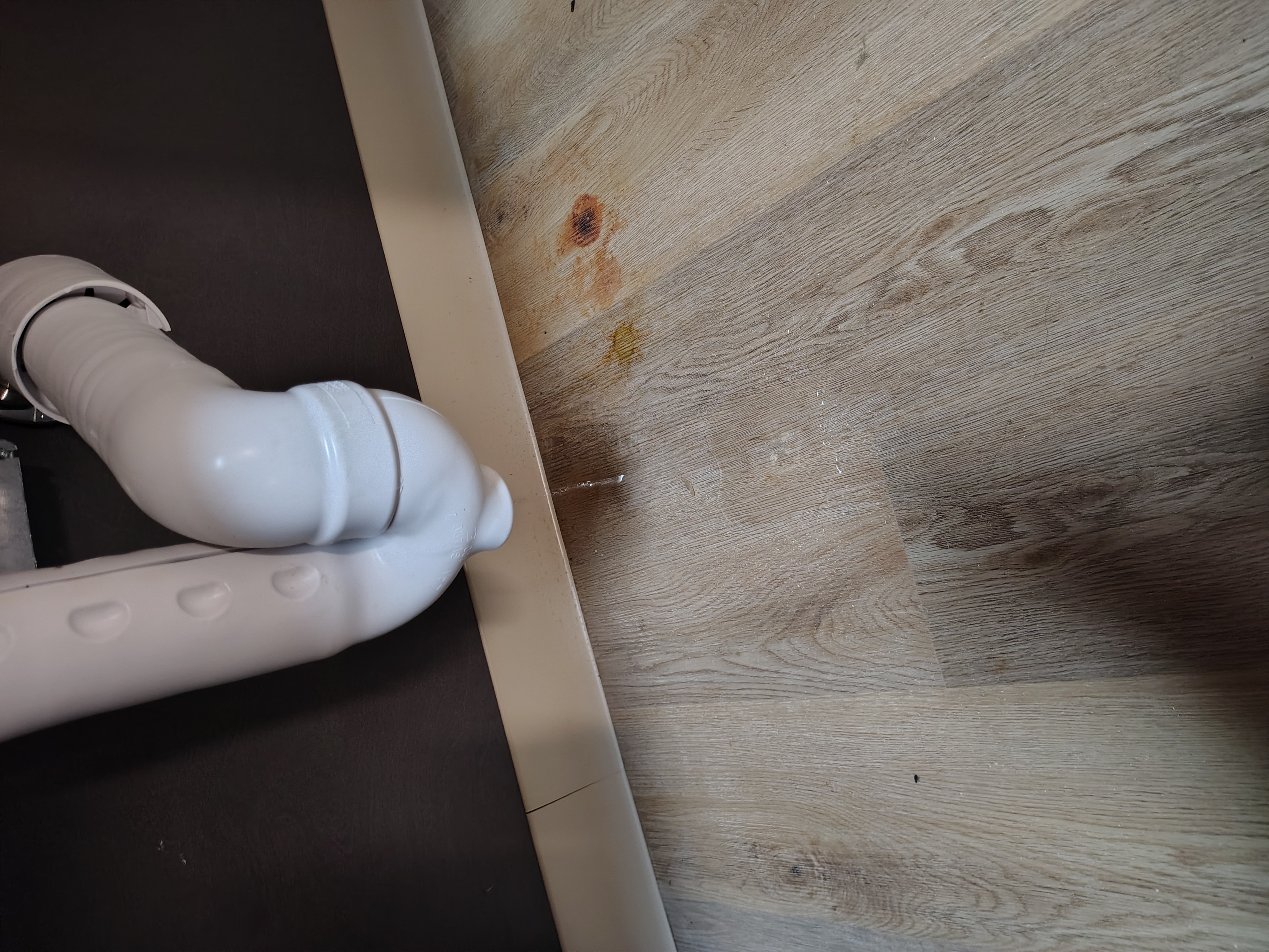Community Room sink trap dripping onto the floor